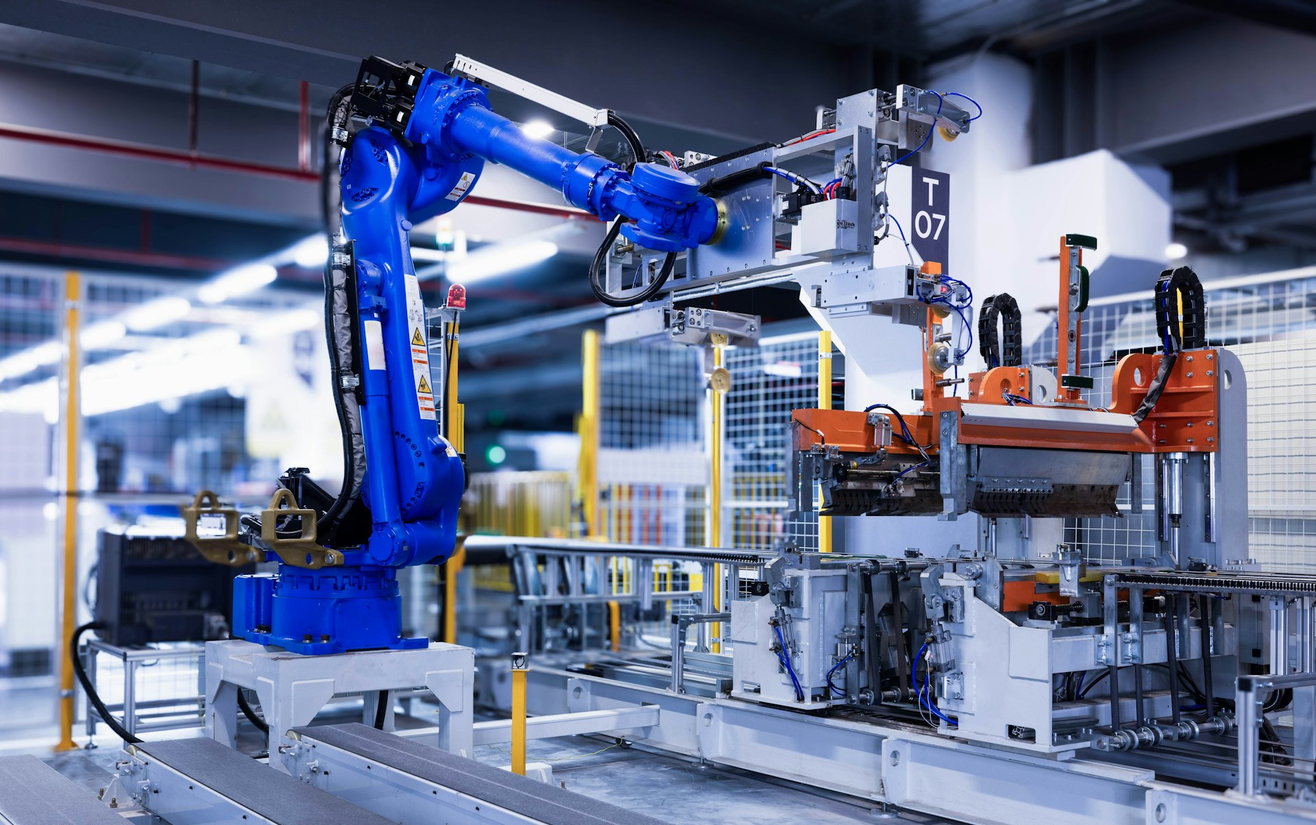 Industrial robot arm on a production line
