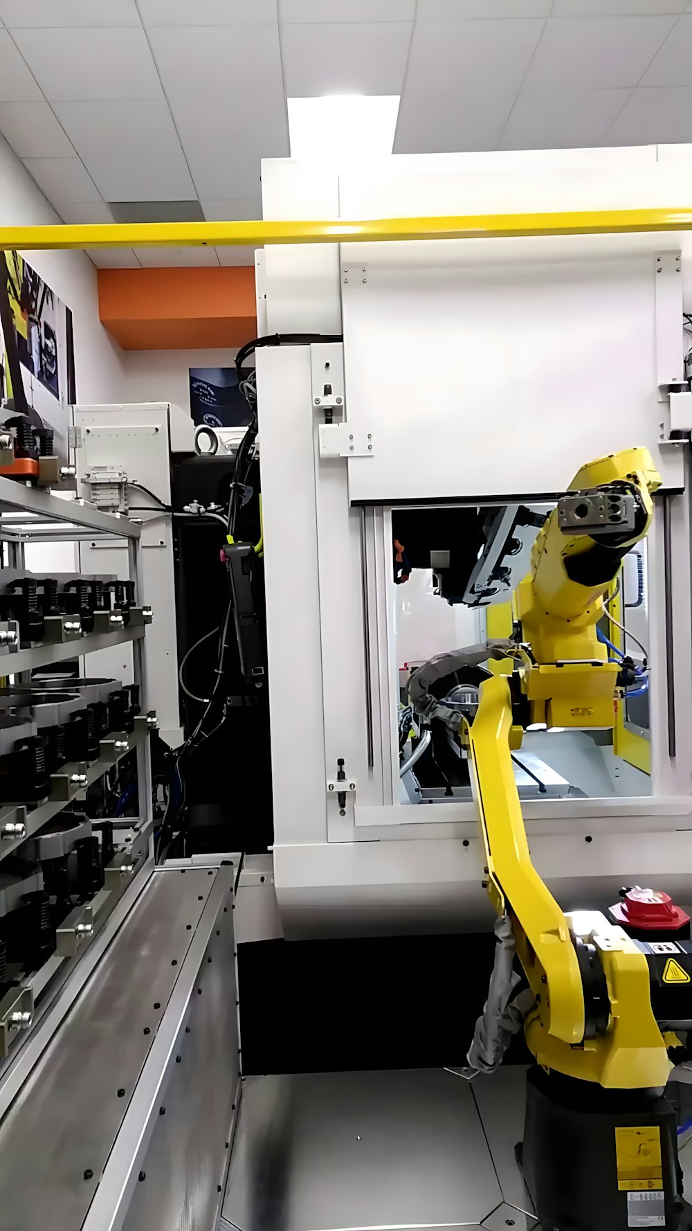 Automated machine cell in a factory